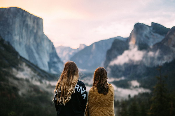 Activating Purpose – two people looking at mountain range